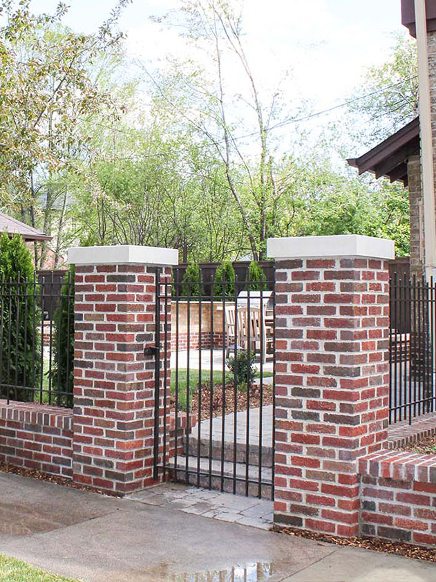 Residential gate with brick columns installed in Denver Metro Front Range area